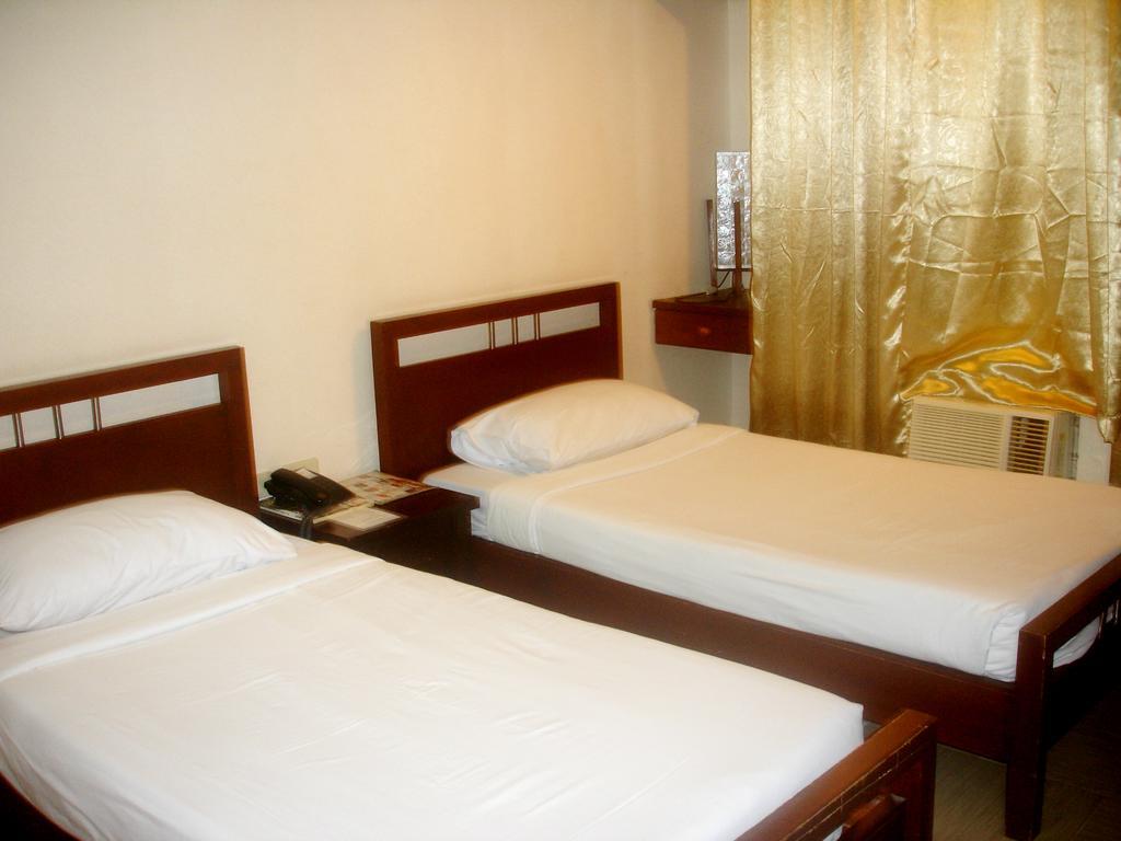 Hôtel Roxas Midtown Chambre photo