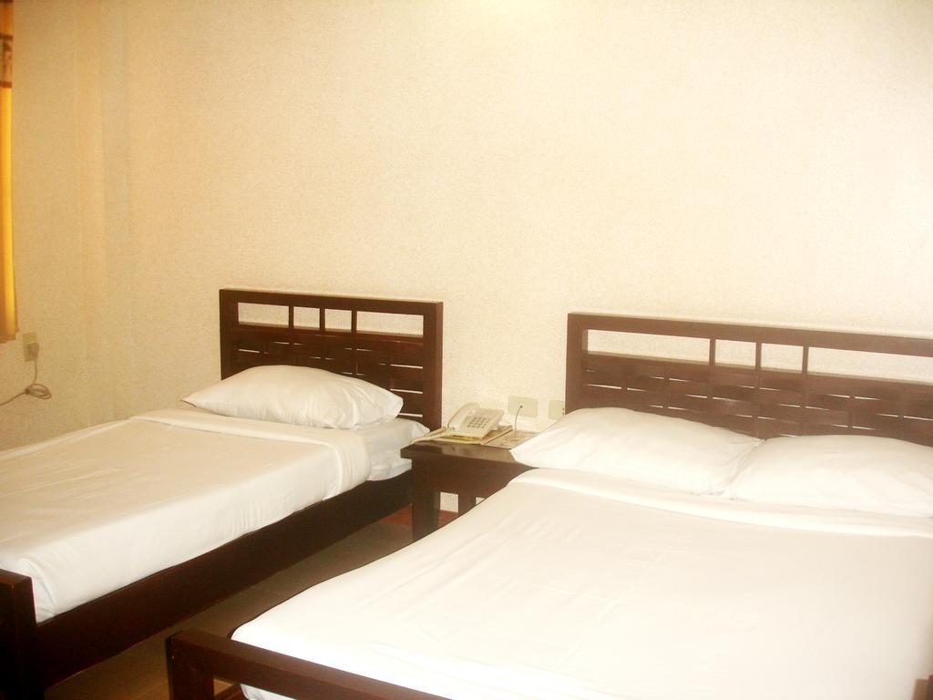 Hôtel Roxas Midtown Chambre photo