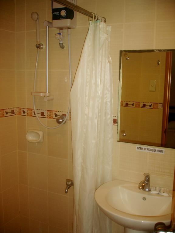 Hôtel Roxas Midtown Chambre photo