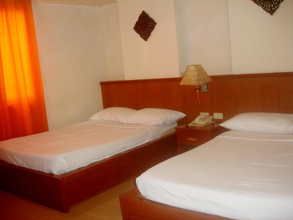 Hôtel Roxas Midtown Chambre photo