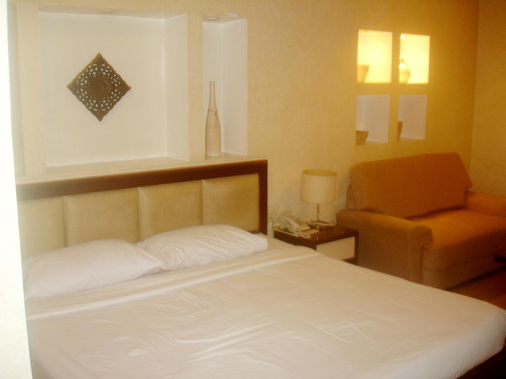 Hôtel Roxas Midtown Chambre photo